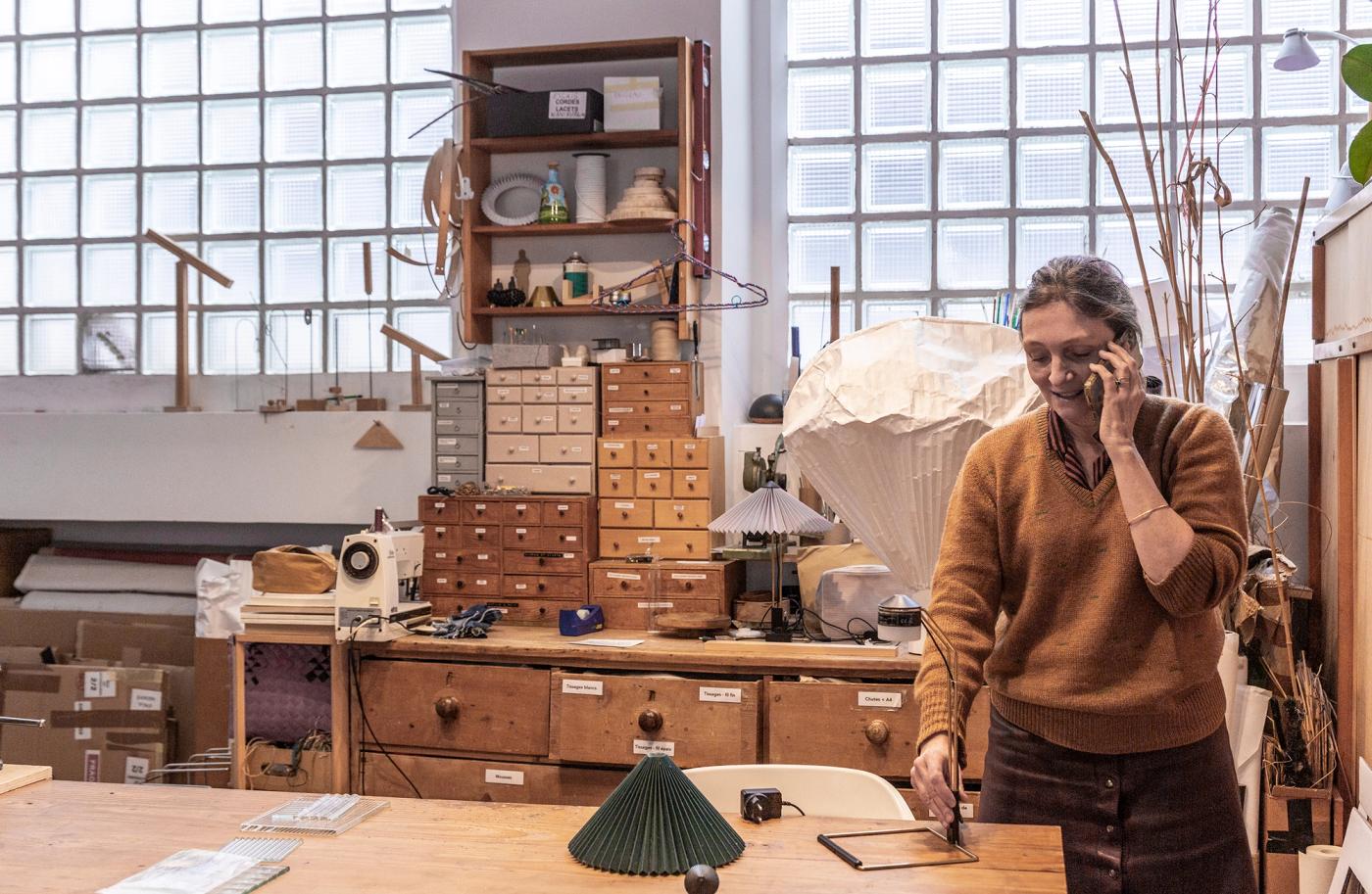 Inga Sempé in her Paris studio, surrounded by design materials and storage drawers