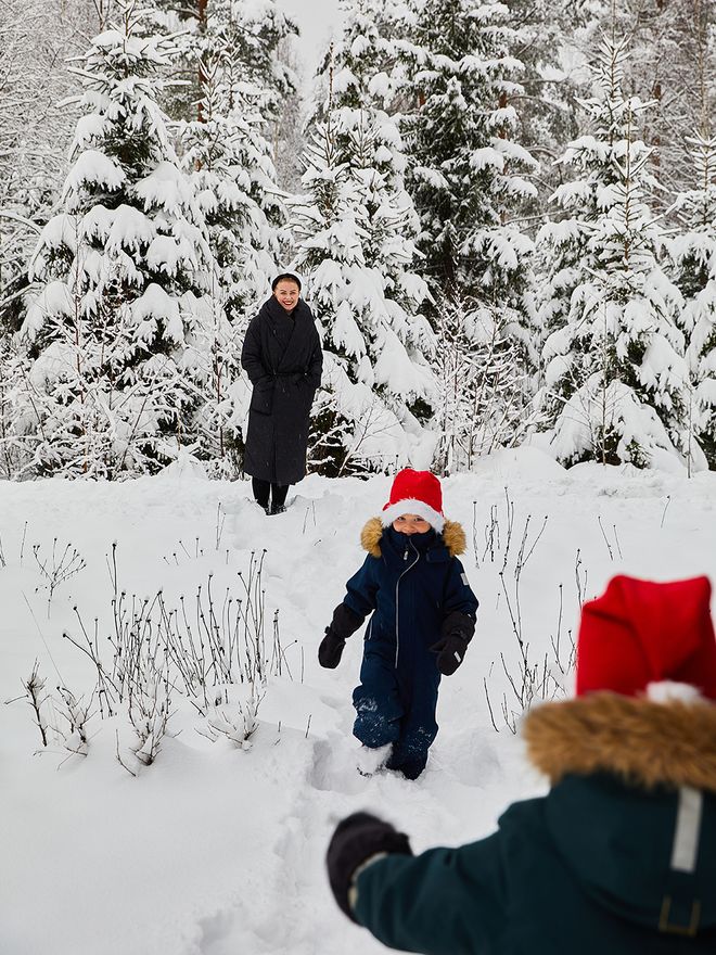 Children playing in the snow in Finland.