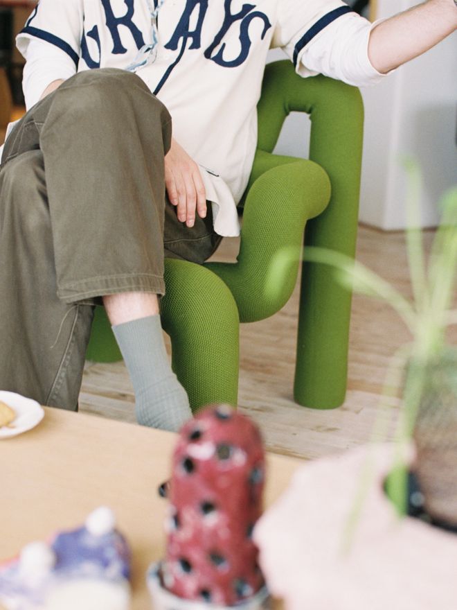 Maria Brinch sitting in the Ekstrem lounge chair, photographed by Johanne Nyborg