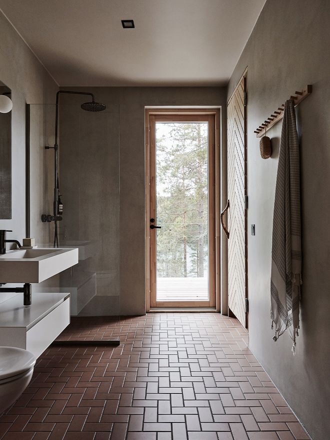 A modern bathroom with tile floor