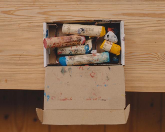 Close-up of chalk pastels on a table