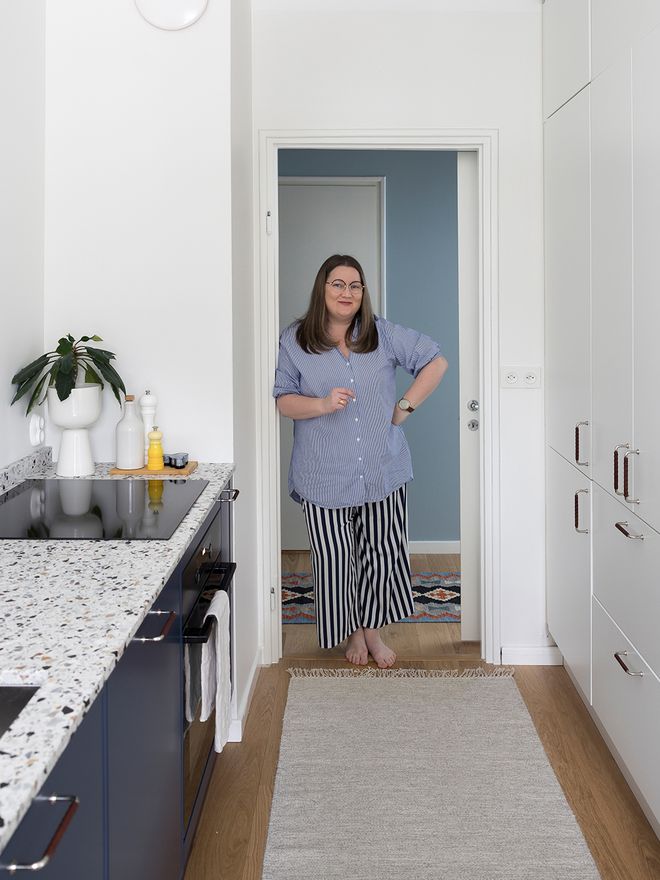 A portrait of Anna Kristeri in her kitchen