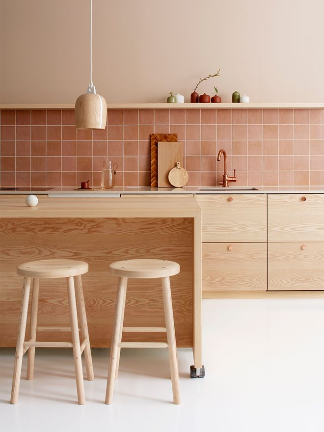 Nikari's Storia stool around a kitchen island.
