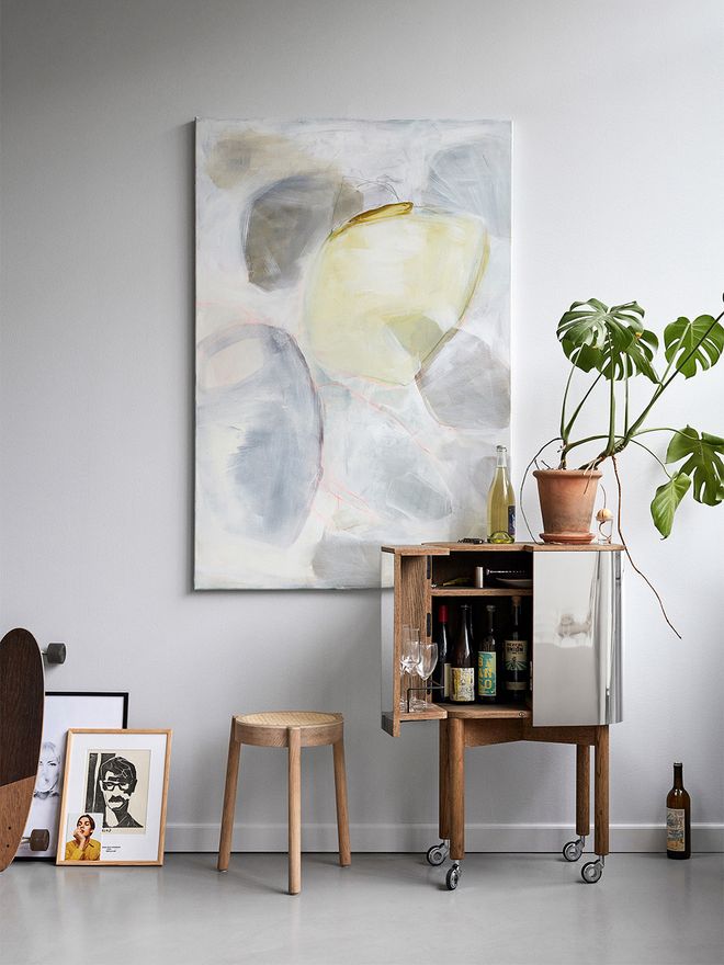 An image of Northern's Loud bar cabinet as part of the living room decor.