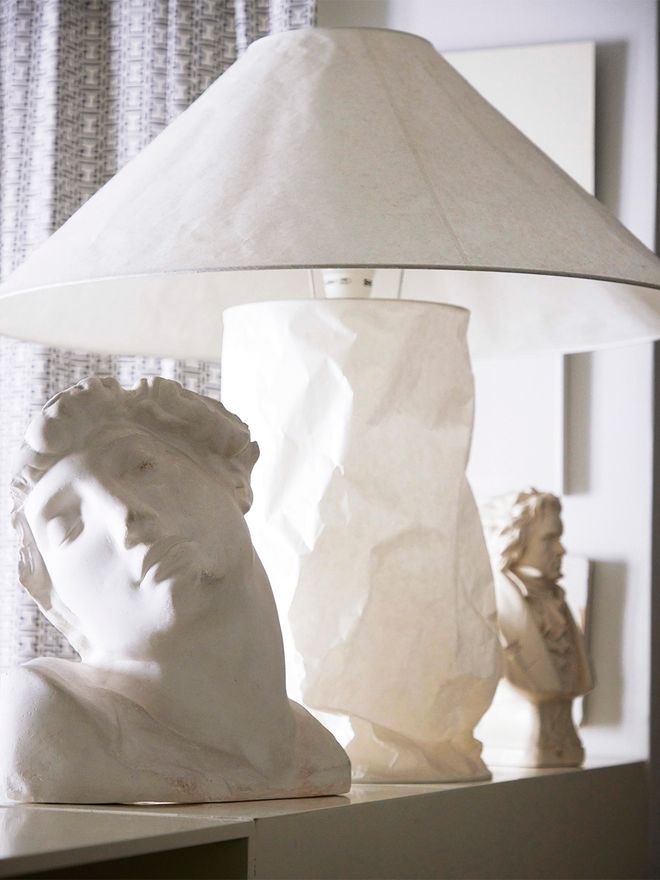 White table lamp and sculptures at Johanna and Daniel Bruun's home