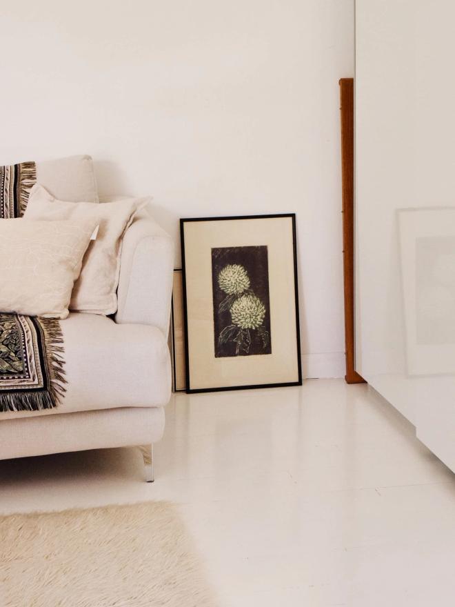 White sofa and shepherd’s rug