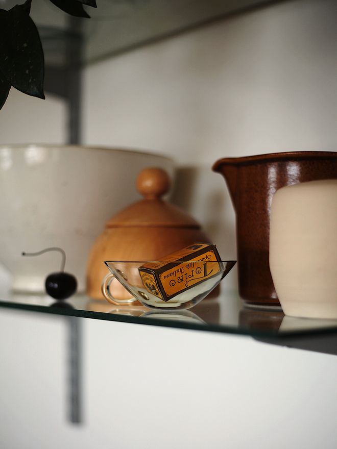 Objects on a glass shelf
