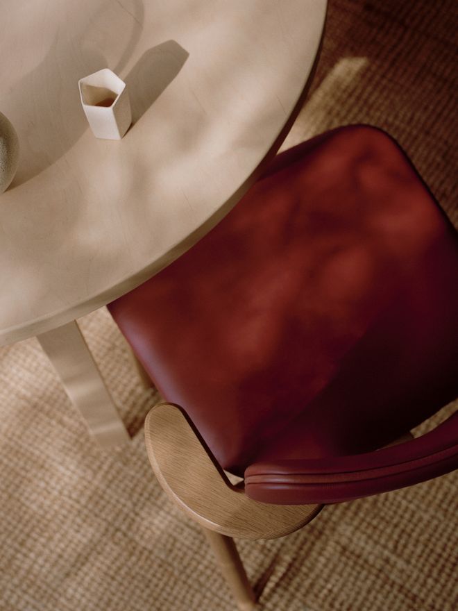 Red leather-upholstered Domus chair