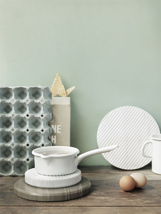 Muuto's Groove trivets in a kitchen setting.