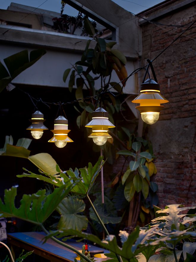 Marset's Santorini pendants in garden.