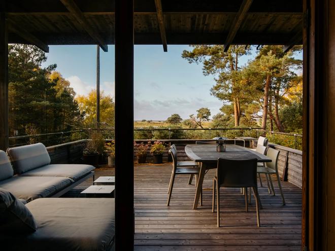 A balcony with a sea view
