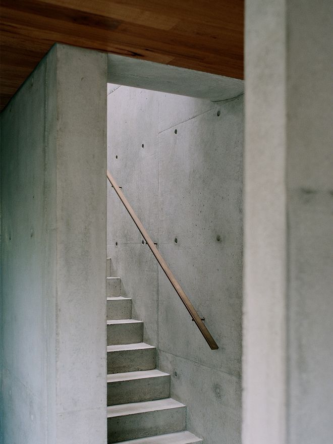 An image of Edition Office's Hawthron House. This image focuses on the concrete staircase.