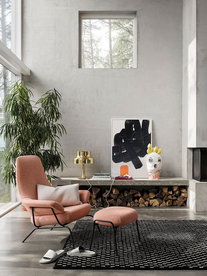 Hem's Hai lounge chair and Hai ottoman in living room decor.