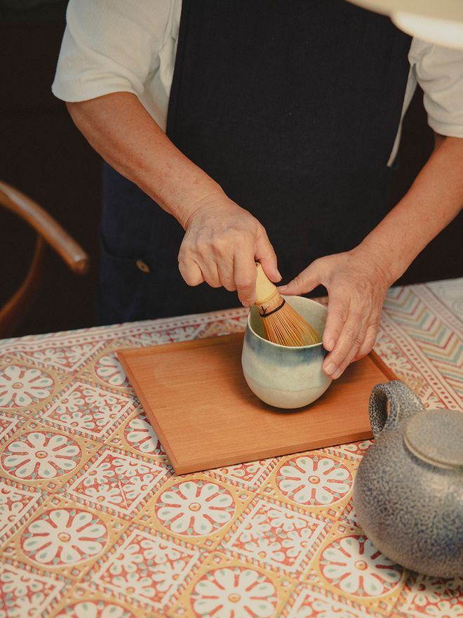 Preparing matcha tea