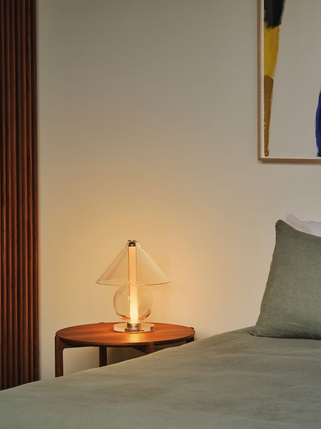 Marset's Fragile table lamp in the bedroom