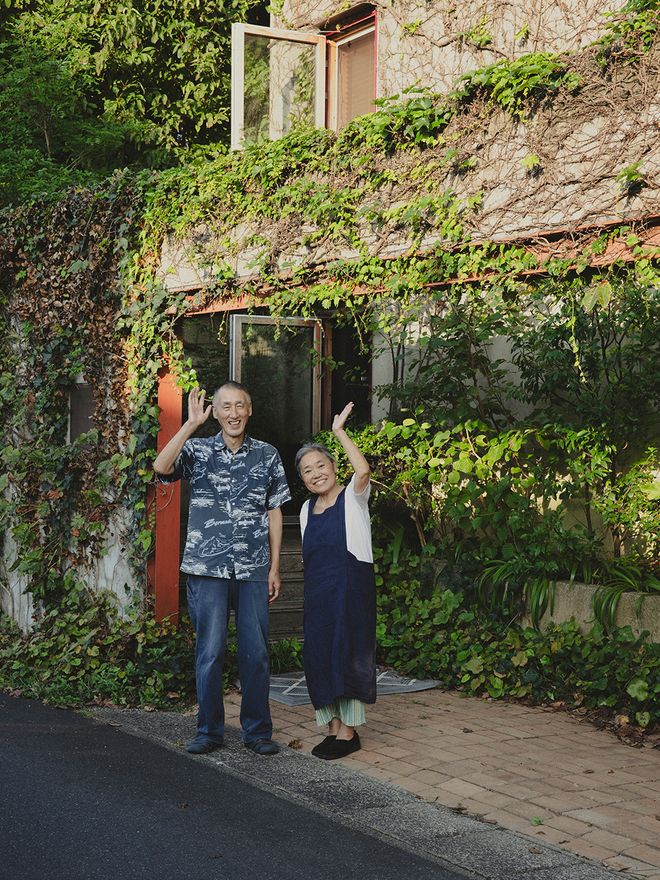 Jun and Yoshiko outside their home in Japan.