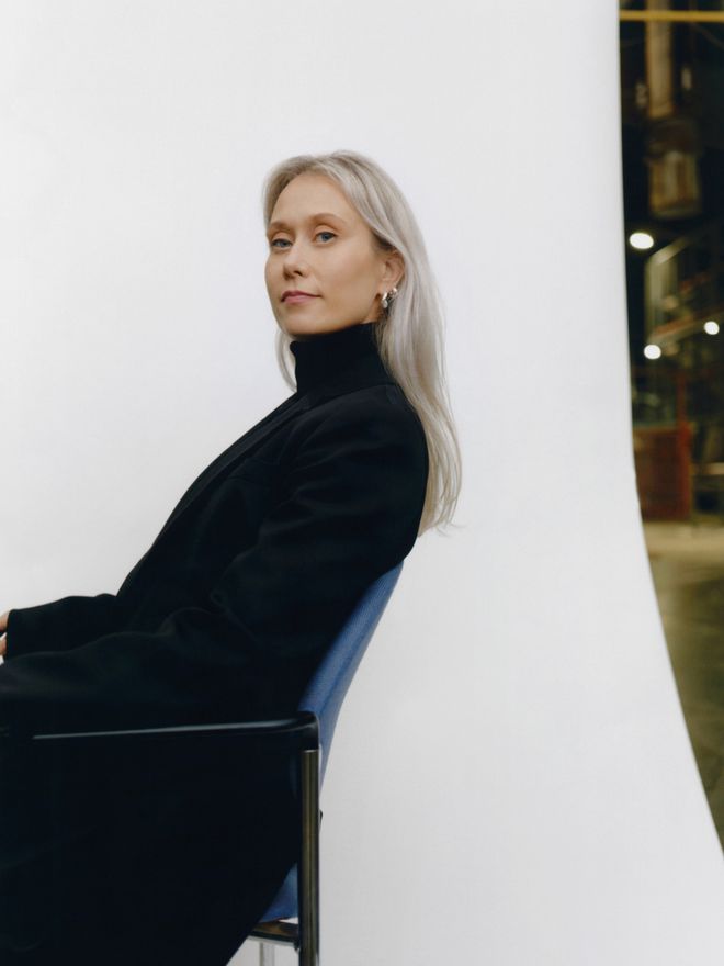 Iittala’s Creative Director Janni Vepsäläinen photographed against a white background