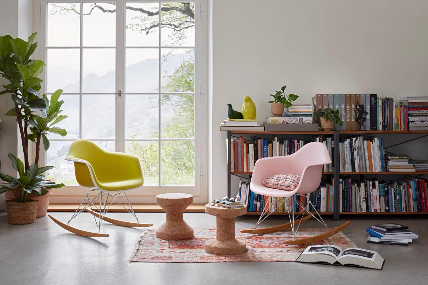 Jasper Morrison’s Cork Family stools for Vitra, used as side tables next to Eames rocking chairs