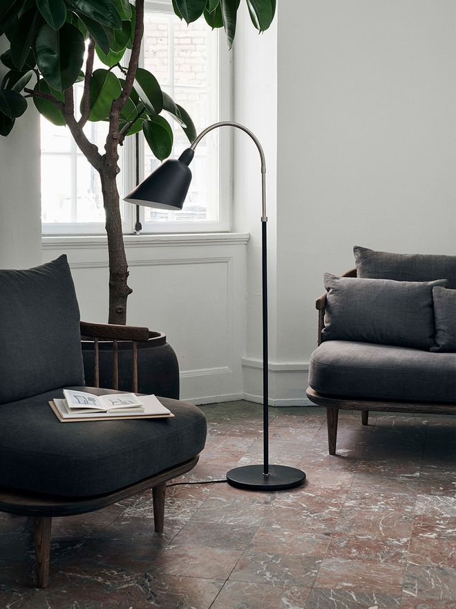 &Traditionin Fly SC1 lounge chairs in living room decor.