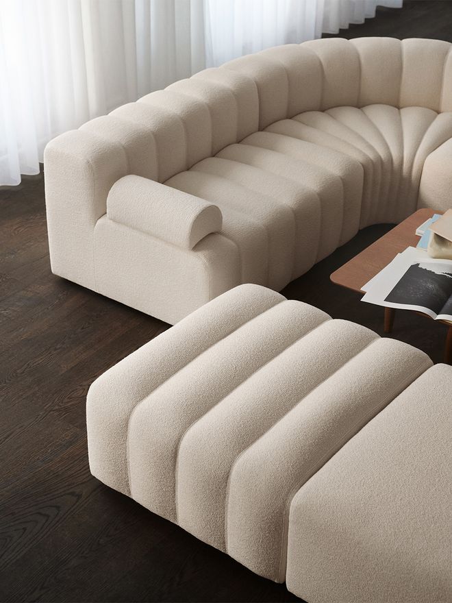 An image featuring the Studio 4 corner sofa by Norr11 as part of the living room decor.