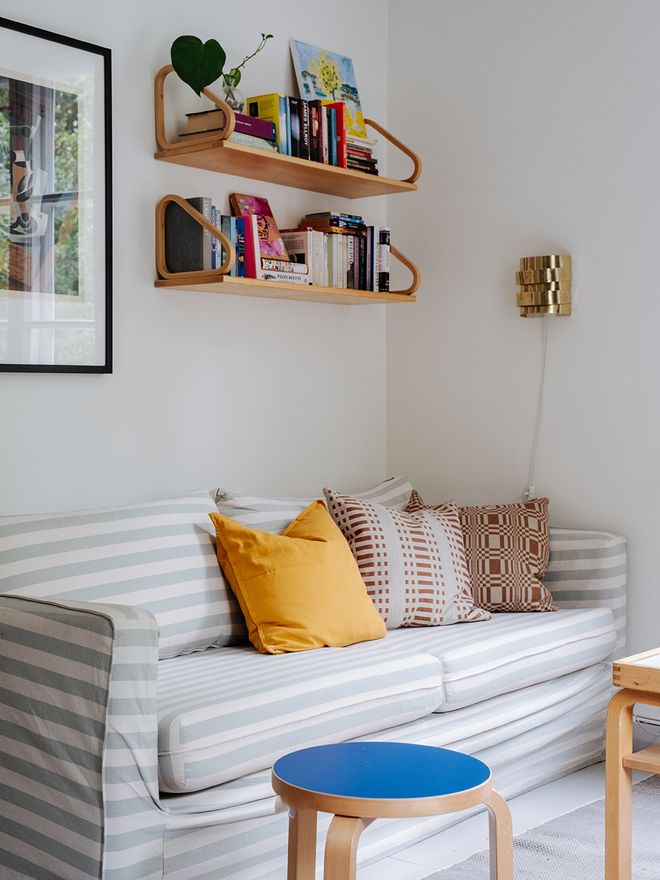 Striped sofa with Johanna Gullichsen cushions