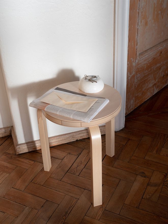 Artek Aalto stool 60 Kontrasti with a some mail and a bowl for keys on top