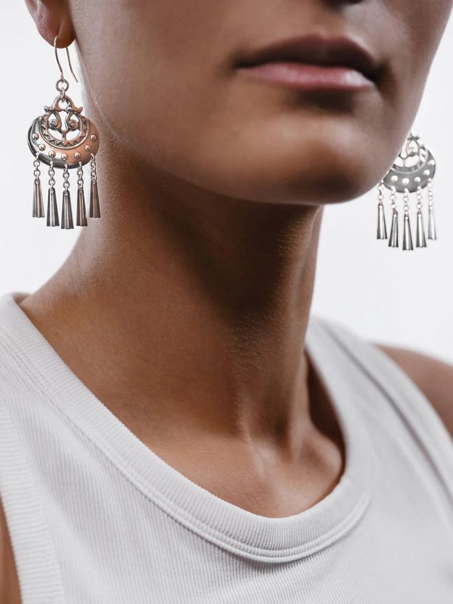 Kalevala Koru Kuutar earrings worn by a model.