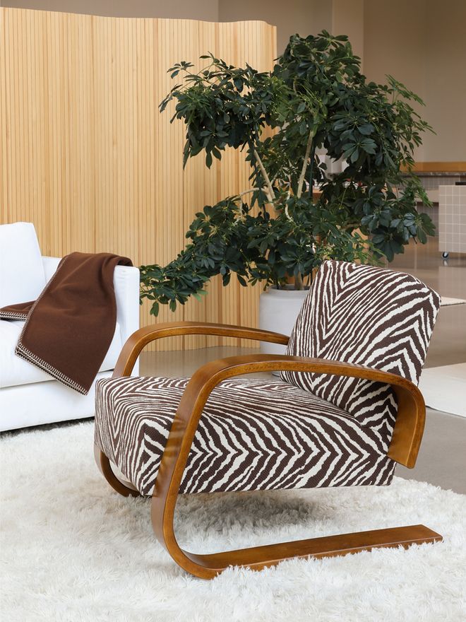 Artek's Tankki chair upholstered in brown Zebra fabric