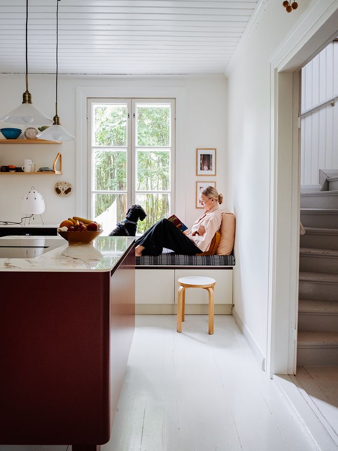 Kitchen window seat with a cushion upholstered in Johanna Gullichsen fabric