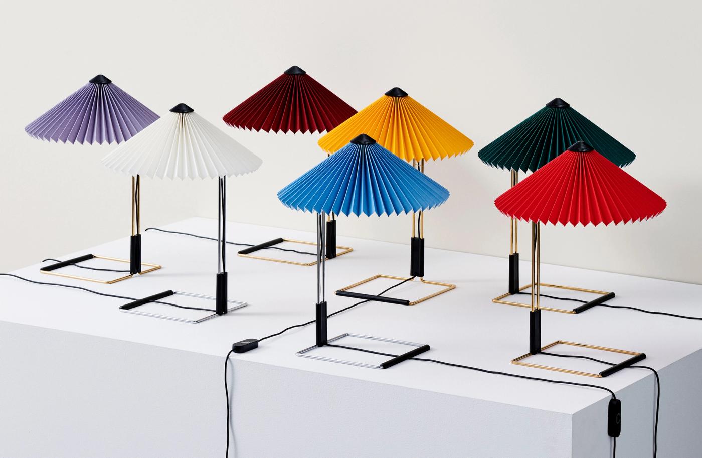 HAY Matin table lamps in a range of colors including purple, yellow, red, blue, and teal