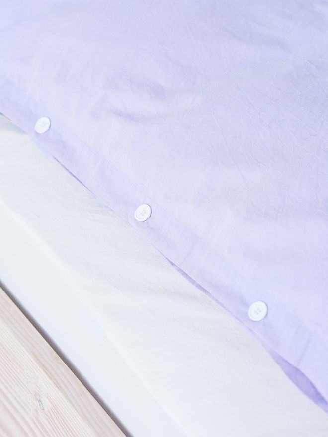 Tekla's lavender duvet cover in a close up.