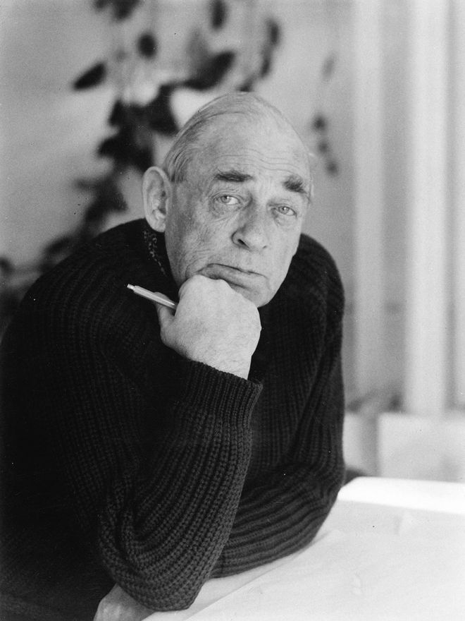 A black and white portrait of architect Alvar Aalto