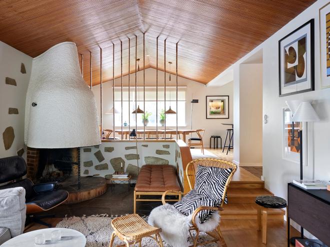 Image of a living room with a 1950s fireplace