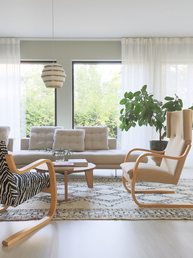 An image featuring Artek's Aalto armchairs as part of the living room decor.