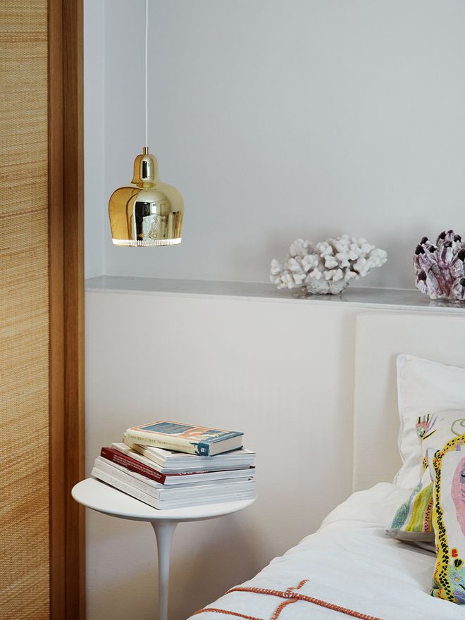 Artek's Aalto pendant A330S "Golden Bell" in bedroom