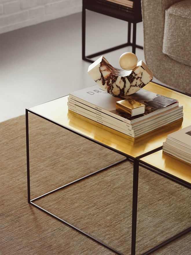 An image featuring by Lassen's Twin coffee tables up close, as part of the living room decor.