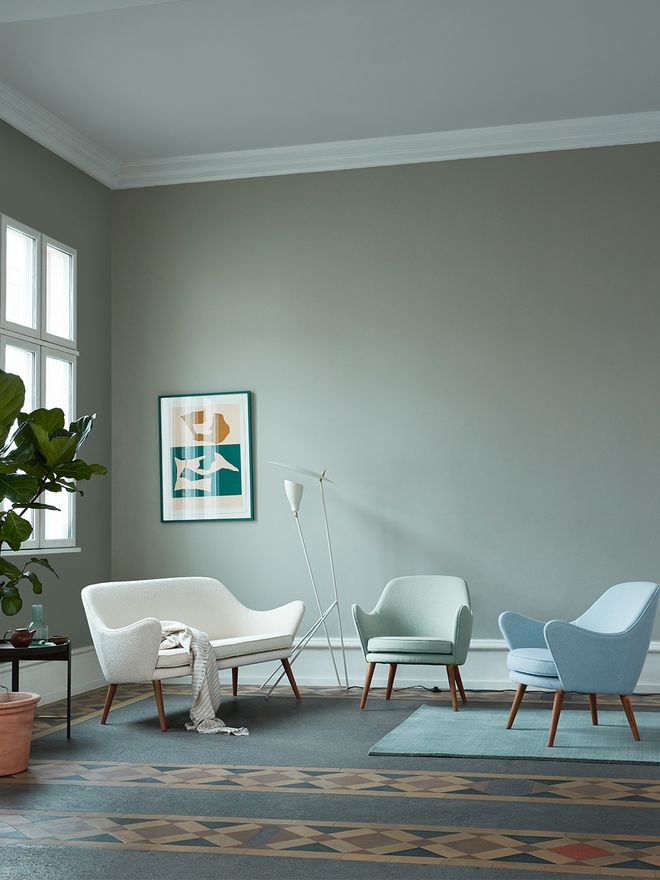Warm Nordic's Dwell couch and Dwell armchairs in a living room setting.