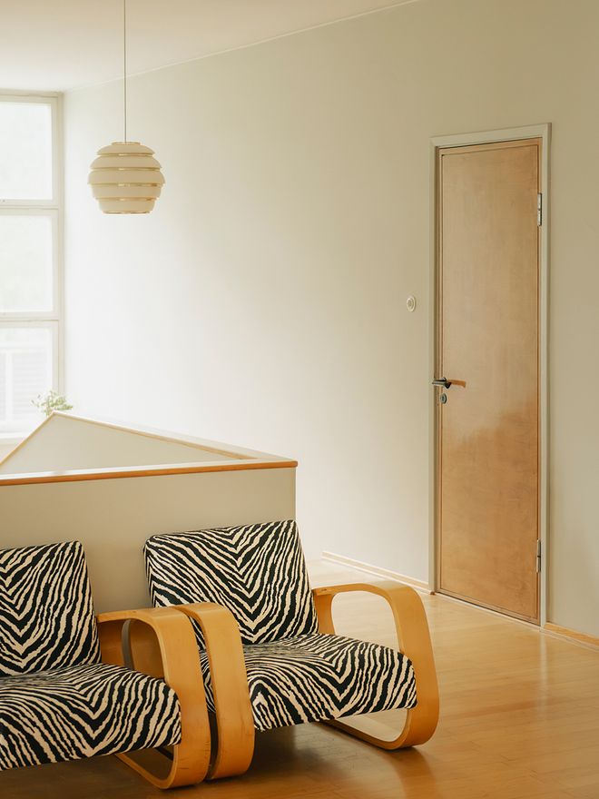 The upper floor of Kantola in Sunila, with Aalto's Tank armchairs