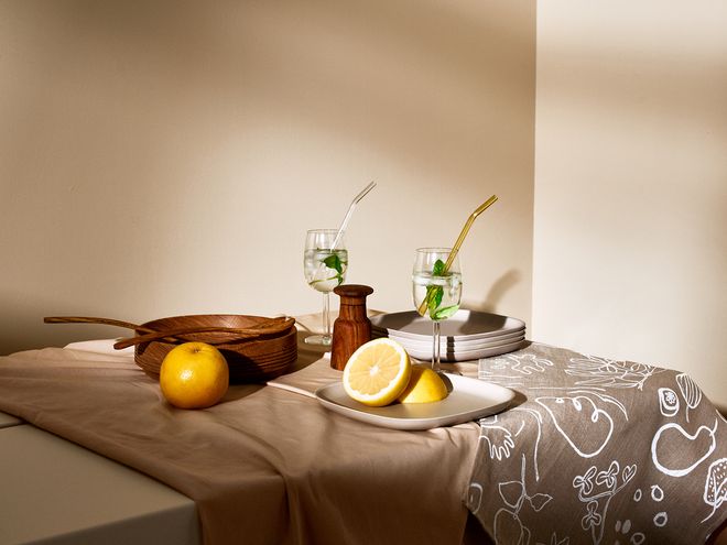 A table setting of warm brown tones.