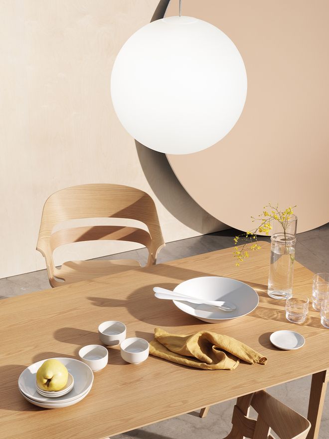 An image featuring Design House Stockholm's Luna lamp as part of the dining room decor.