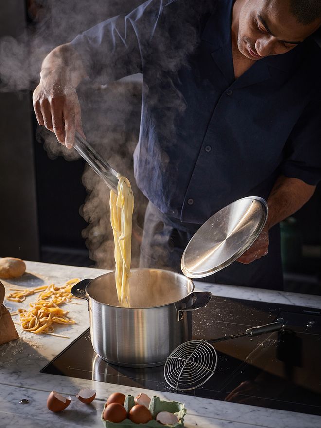 Man cooking with Fiskars' All Steel casserole