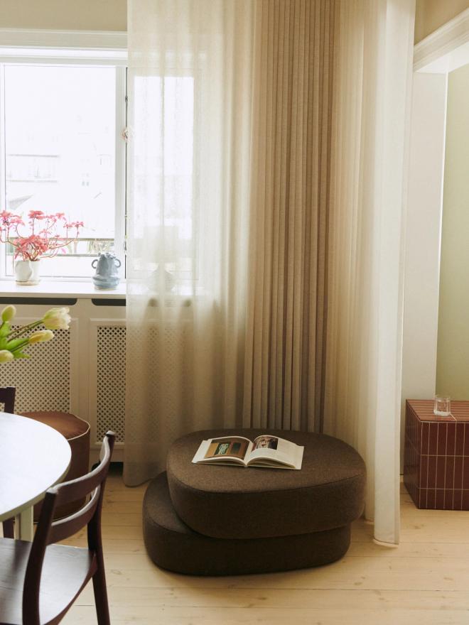 Ferm Living's Plyo Ottoman in the corner 