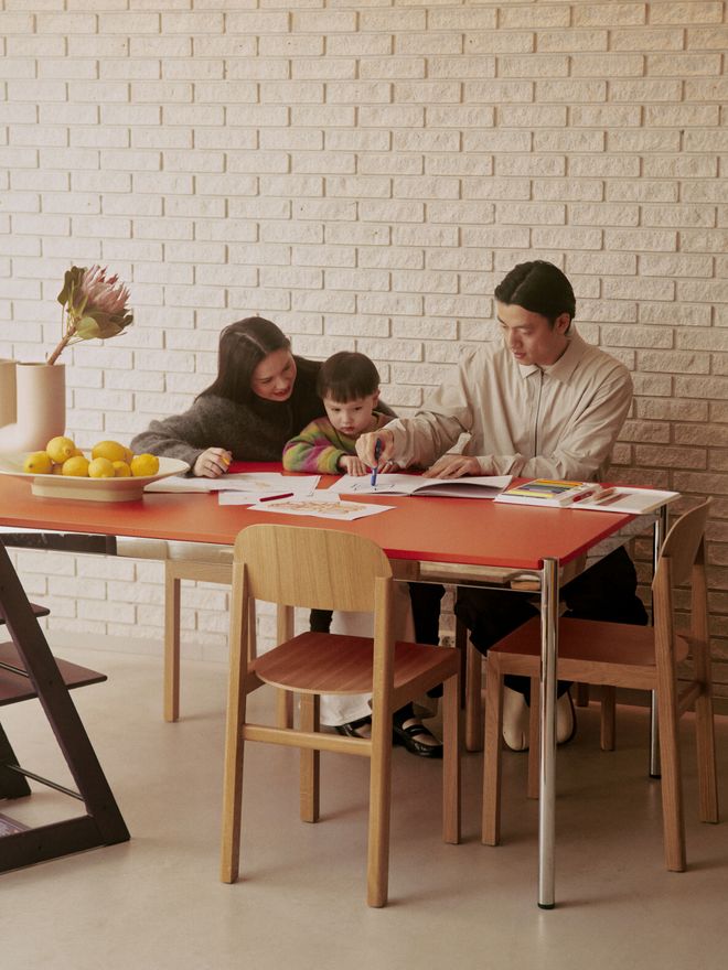 Adeline, Lian and Wai by the dining table
