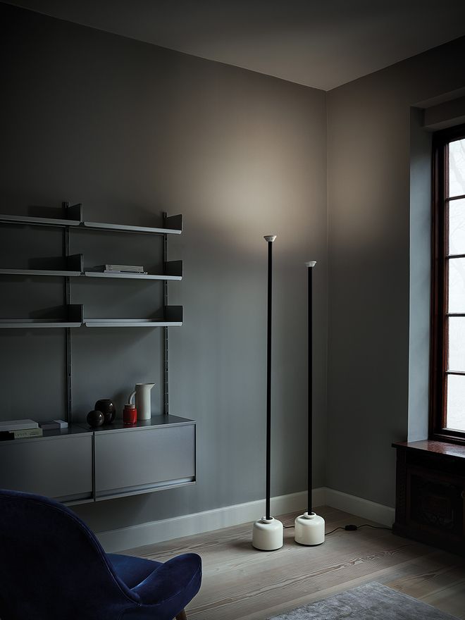 Astep Model 1095 floor lamps in the corner of a room