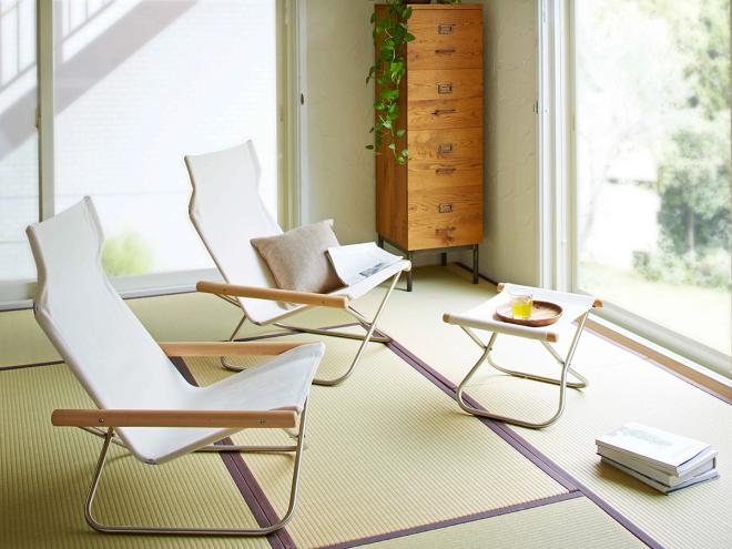 Two Nychair X armchairs and an ottoman on tatami mats
