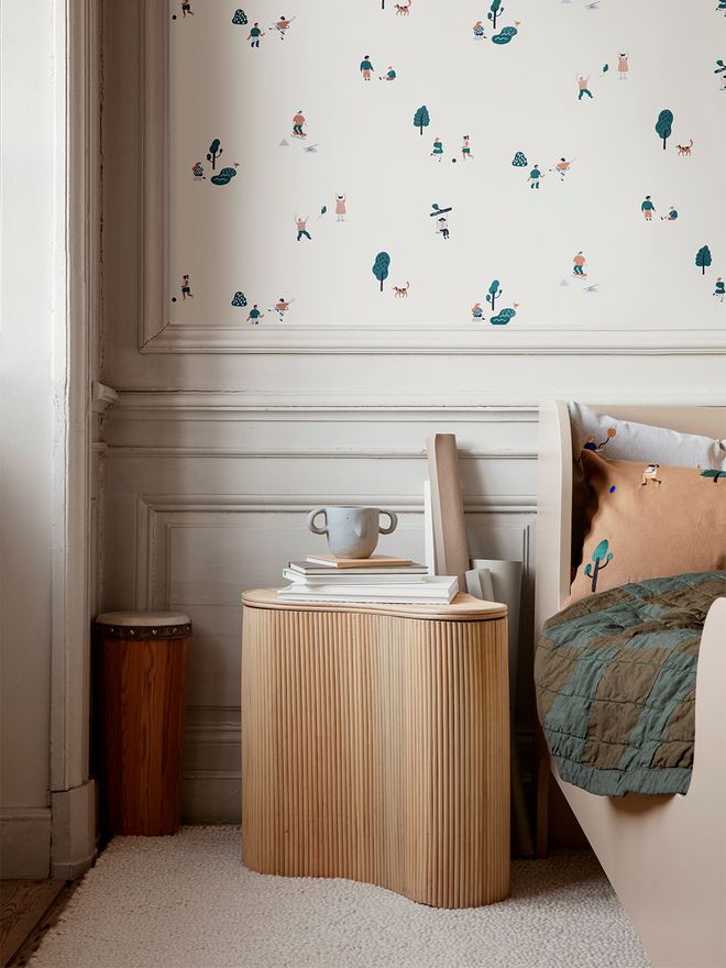 An image of ferm LIVING's Isola storage table as part of the kids' room decor.