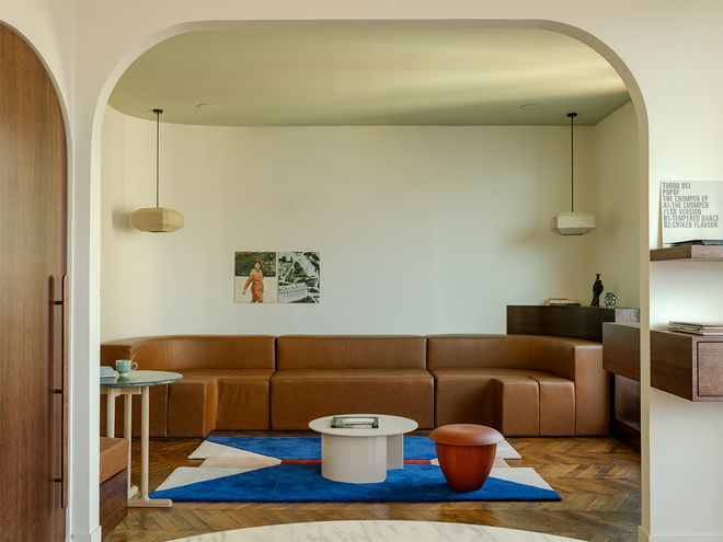 An image of an apartment in Paris, Lunain, designed by architect Louis Denavaut. The image features the living room decor. 