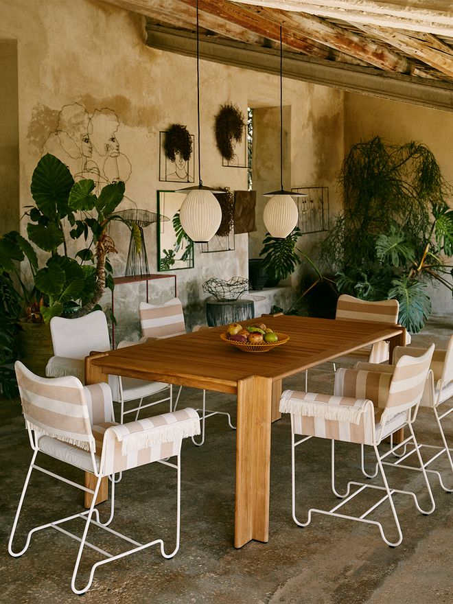 GUBI Tropique chair with striped upholstery and fringes