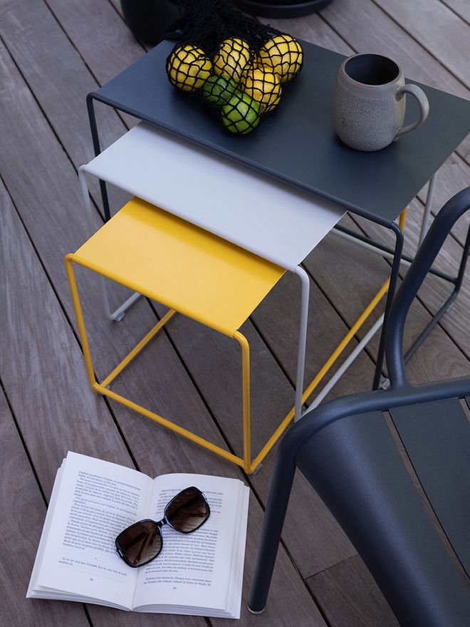 Fermob Oulala nesting table on patio