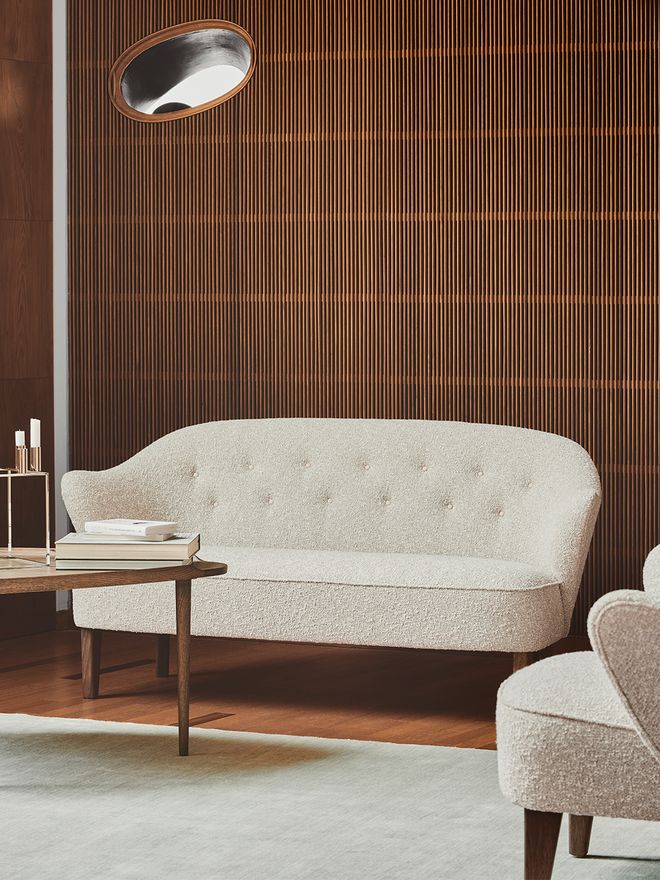 An image featuring by Lassen's Ingeborg sofa and lounge chair as part of the living room decor.